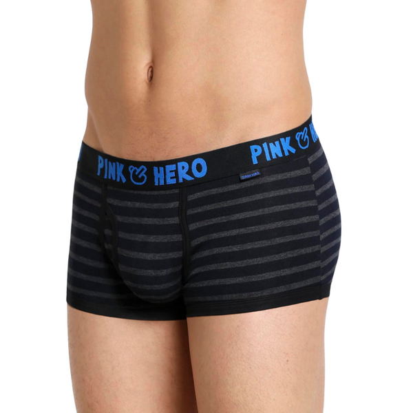 Black and charcoal striped boxer briefs with a blue PINK HERO waistband, worn by a model