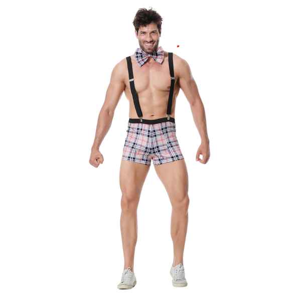 Front-facing model wearing plaid shorts with black suspenders and a matching bow tie