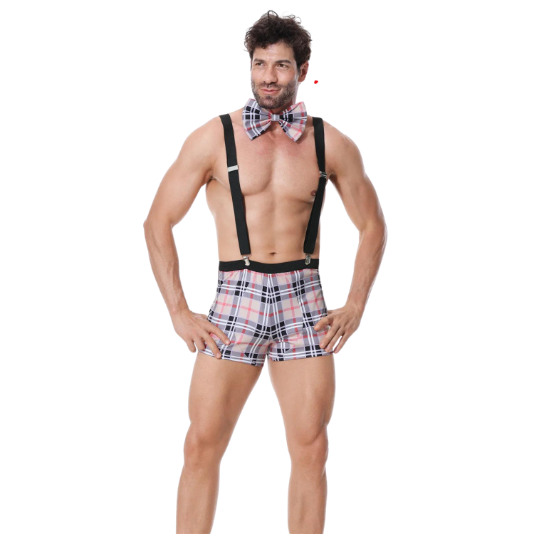Front-facing shirtless model wearing plaid bow tie, suspenders, and boxer shorts