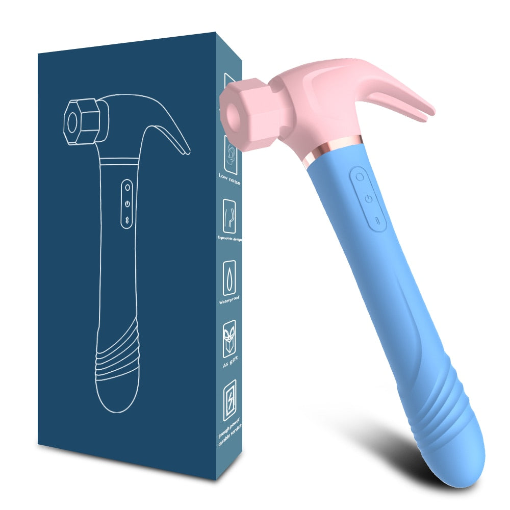 Pink-and-blue hammer-shaped vibrating sex toy beside its product box