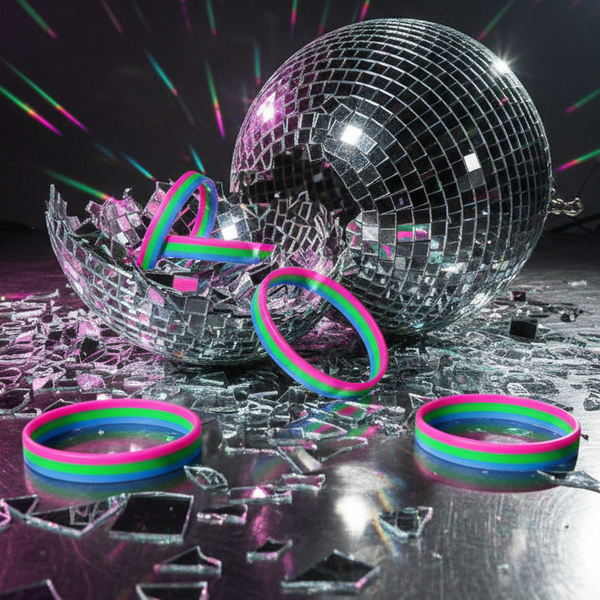 Polysexual Pride rubber wristbands arranged around a broken disco ball