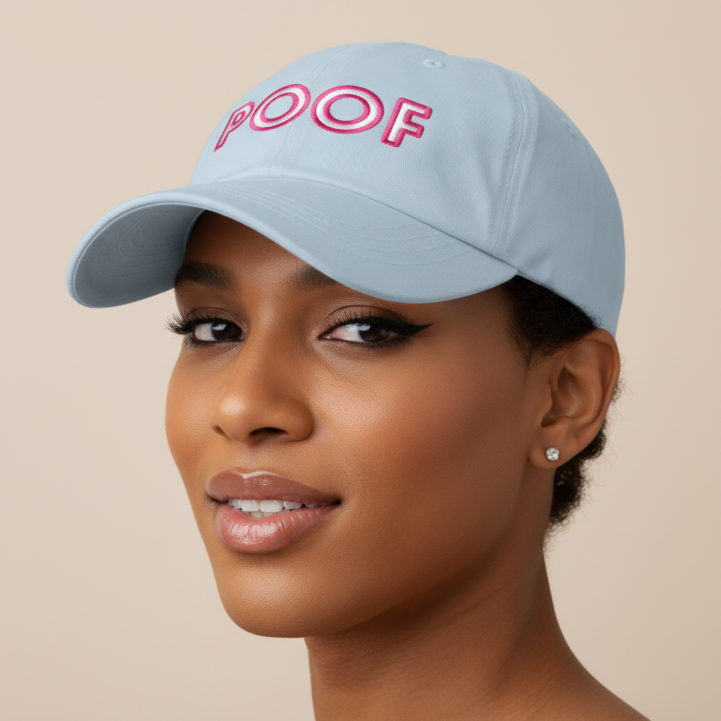 Light blue embroidered dad hat with “POOF” in pink letters; femme with brown skin, winged liner, glossy lips, studs