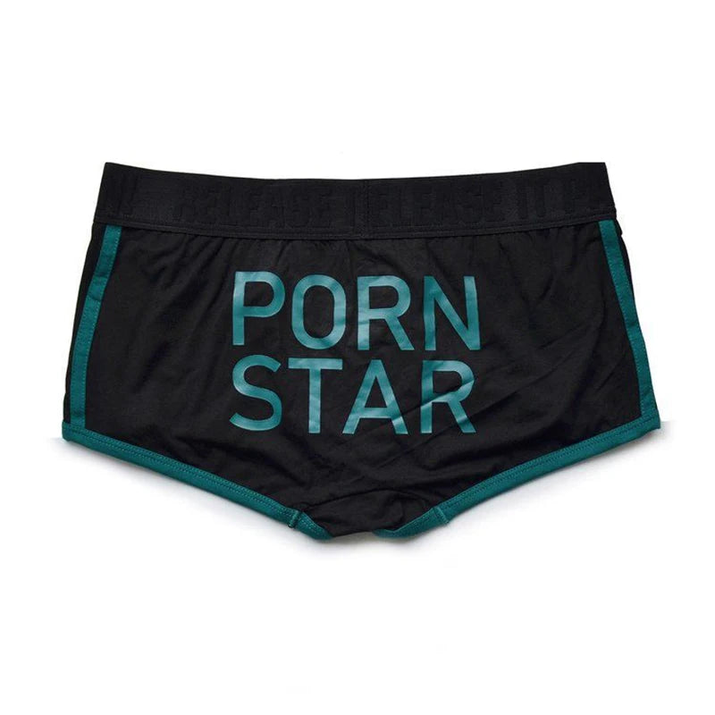 Front view of black briefs with teal trim and large turquoise “PORN STAR” lettering