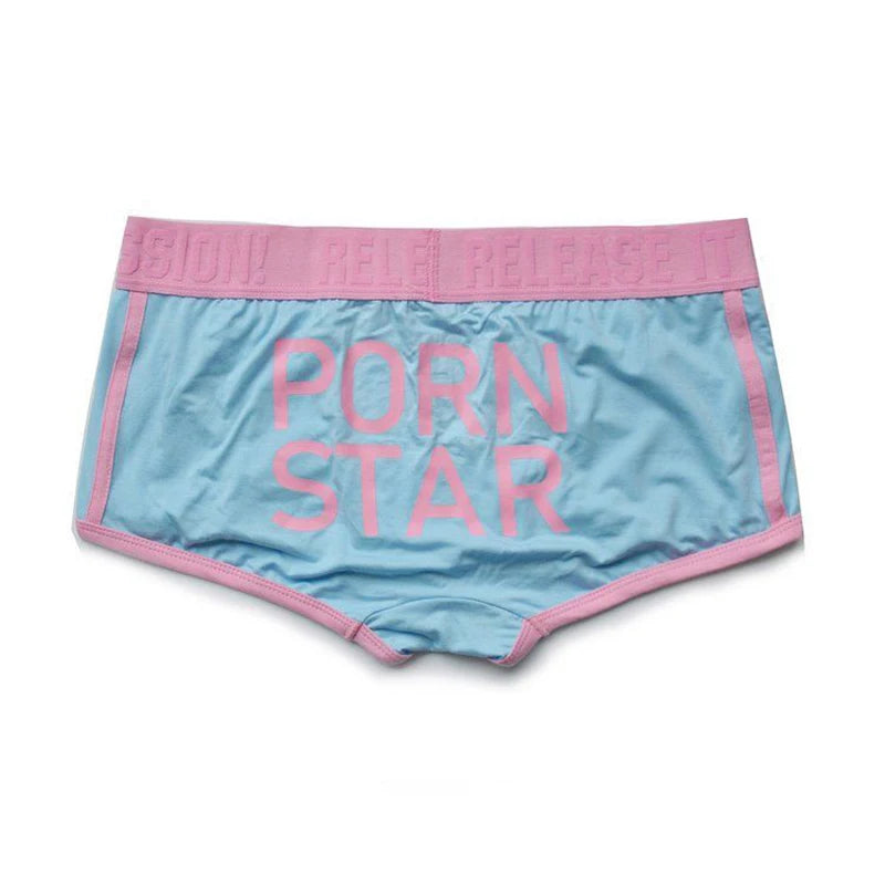 Front-facing turquoise briefs with pink trim and large pink “PORN STAR” lettering