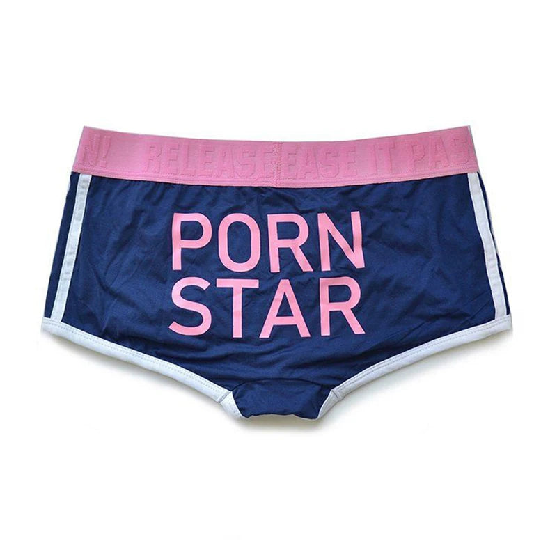 Front view of navy briefs with pink waistband and large pink “PORN STAR” lettering