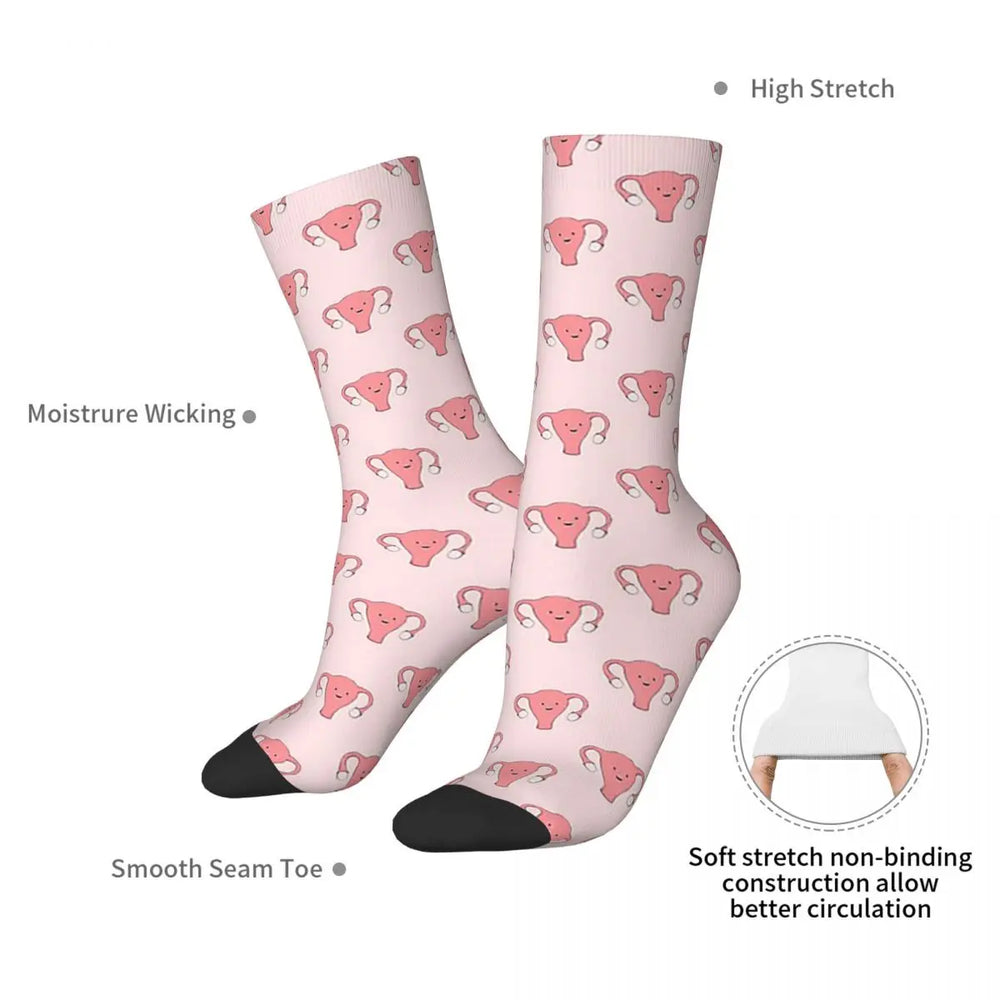 Pair of pink uterus-print socks with black toes, shown crossed with feature callouts
