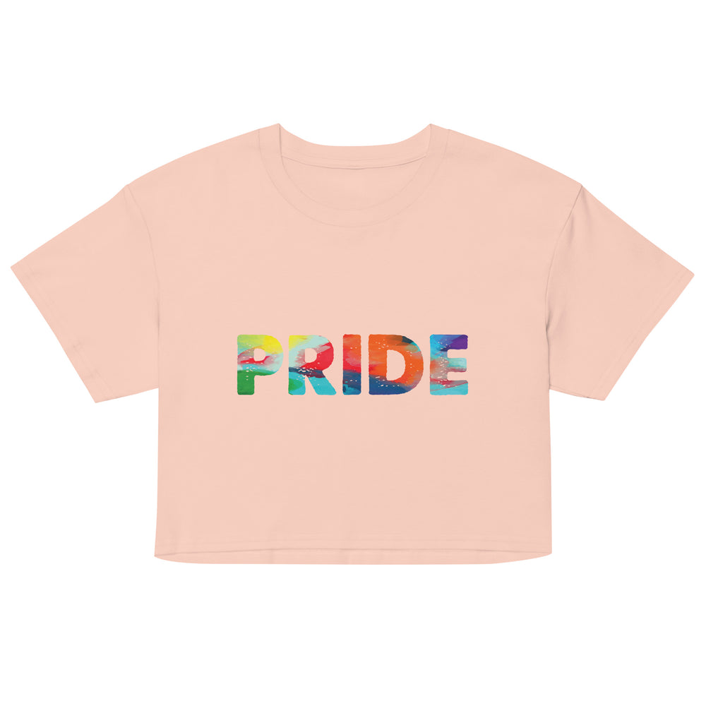 Front view of a pale pink cropped T-shirt with colorful rainbow-style “PRIDE” lettering