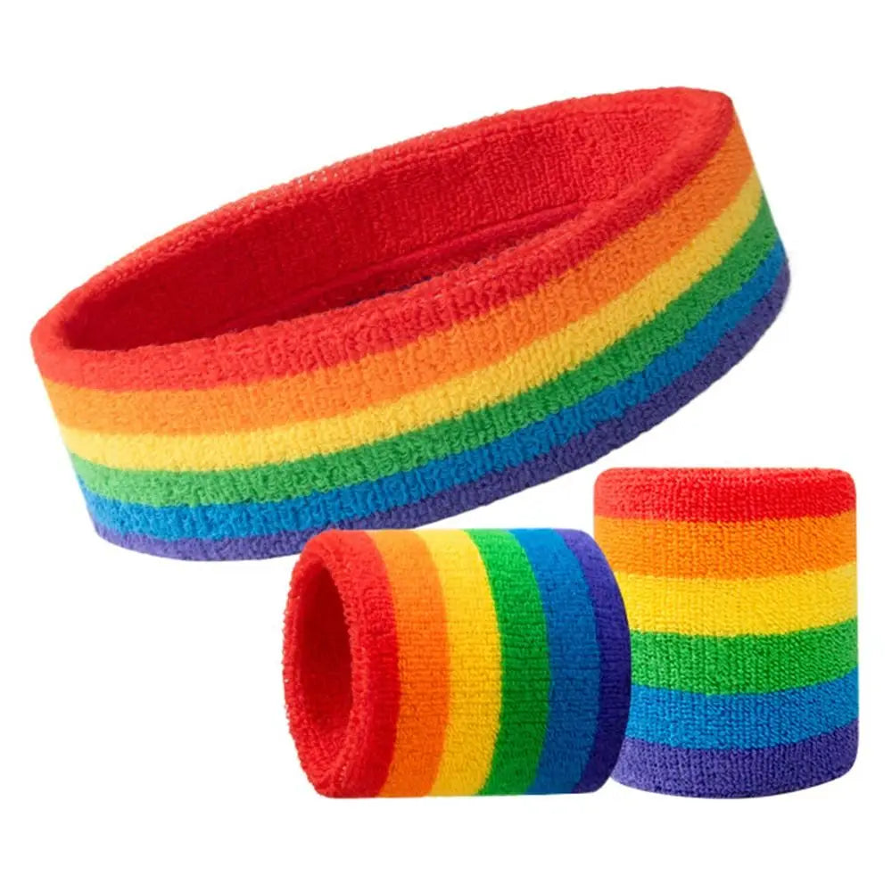 Three rainbow-striped terry sweatbands, including one headband and two wristbands