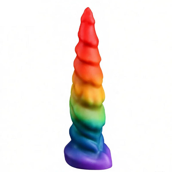 Rainbow silicone dildo with a tapered, ridged shape and broad purple base, shown upright