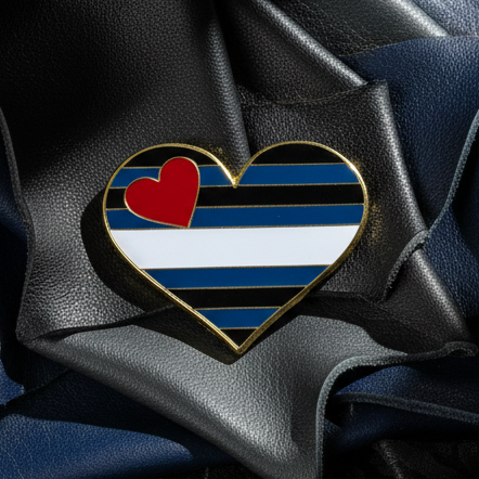 Leather pride heart enamel pin with black, blue, and white stripes and a red heart