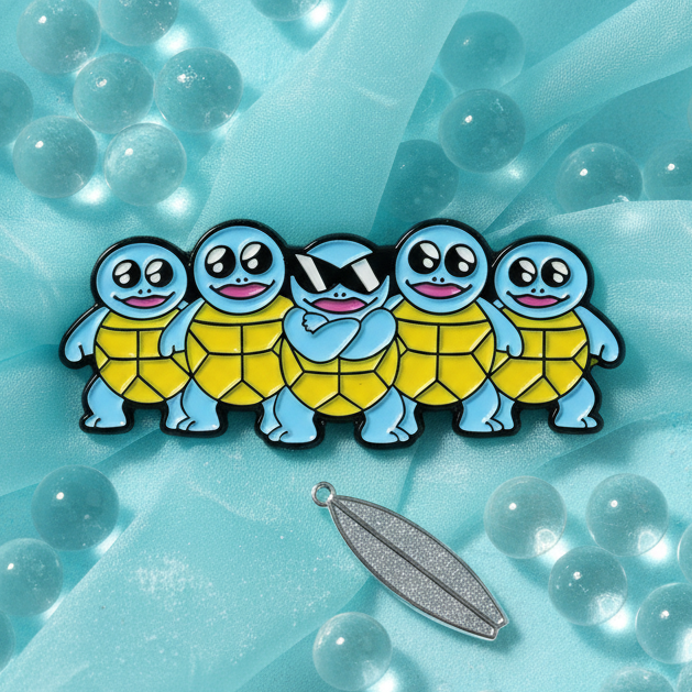 Cool Squirtle Crew Enamel Pin featuring five playful cartoon turtles with blue skin and yellow shells, center turtle in sunglasses, on a shimmery teal fabric. Celebrates LGBTQIA+ pride and self-expression.