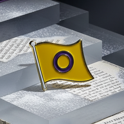 Intersex pride enamel pin with a yellow flag and purple ring on a stepped display