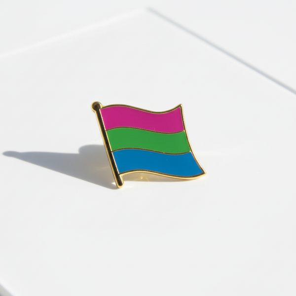 Close-up of a polysexual pride flag enamel pin with pink, green, and blue stripes