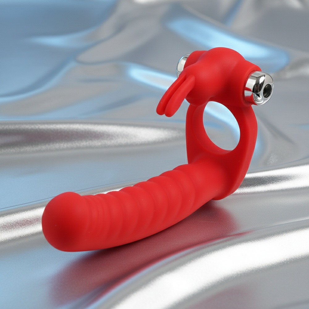 Red vibrating double-ended dildo with ribbed shaft, ring, and two metal-capped motors