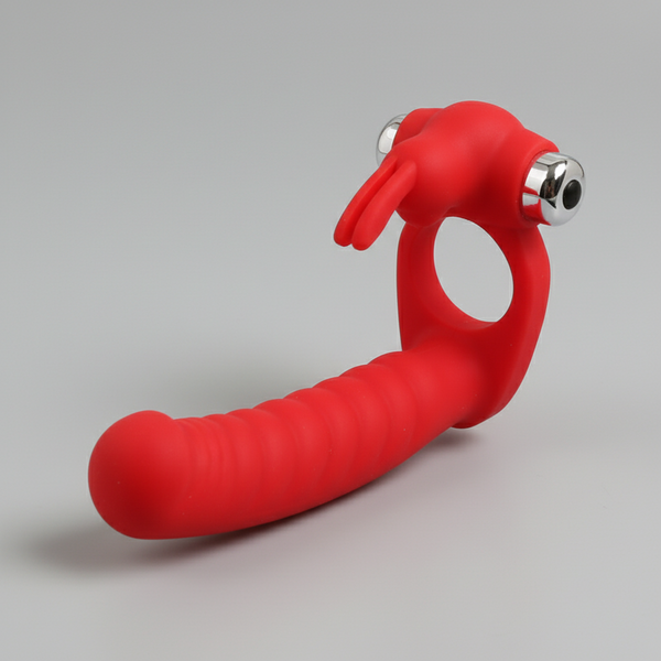 Red vibrating double-ended dildo with ribbed shaft and metallic bullet tips