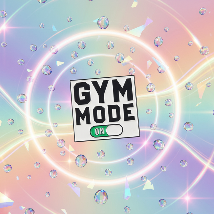 Gym Mode On Enamel Pin featuring bold black text on a white plaque with a green toggle, surrounded by pastel-rainbow swirls and crystal bubbles, embodying vibrant queer pride and empowerment.