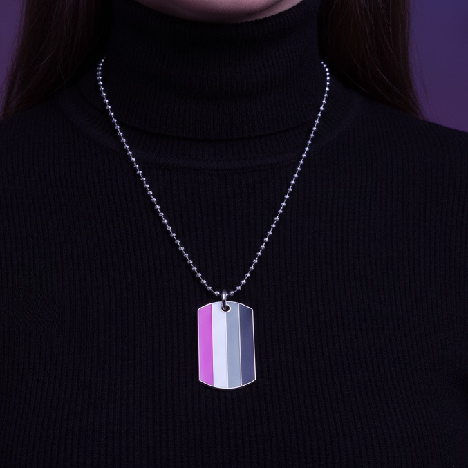 Close-up of a striped pride dog-tag necklace on a black ribbed turtleneck
