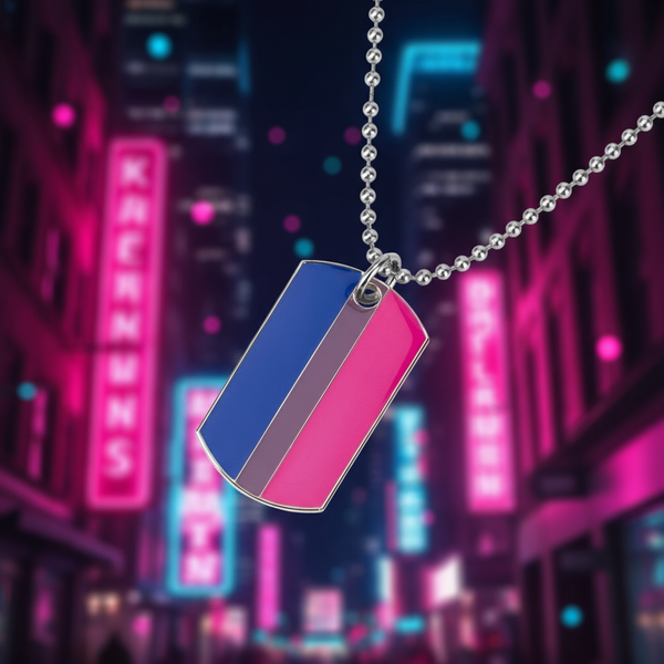 Blue, purple, and pink striped tag pendant on a silver ball chain against neon city lights