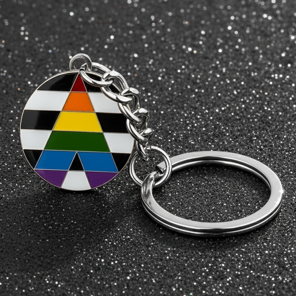 Straight ally pride keychain with black, white, and rainbow-striped enamel charm
