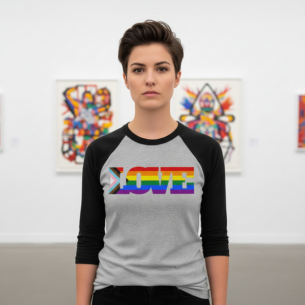 3/4 sleeve raglan tee with “LOVE” in rainbow stripes and Progress Pride arrow