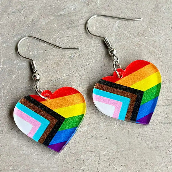 Pair of heart-shaped acrylic dangle earrings with Progress Pride flag stripes
