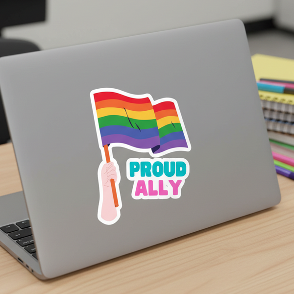 Proud Ally Bubble-Free Sticker on laptop; hand waves rainbow flag with 