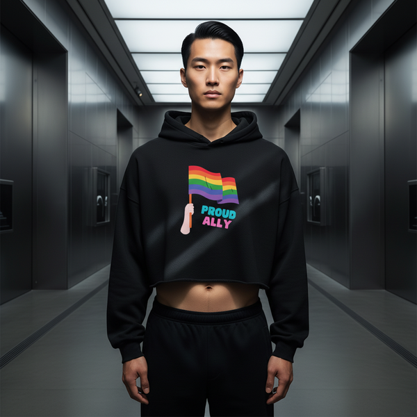 Proud Ally Crop Hoodie with rainbow flag and “Proud Ally” text, worn by a young man in black pants; queer vibe, serious look.