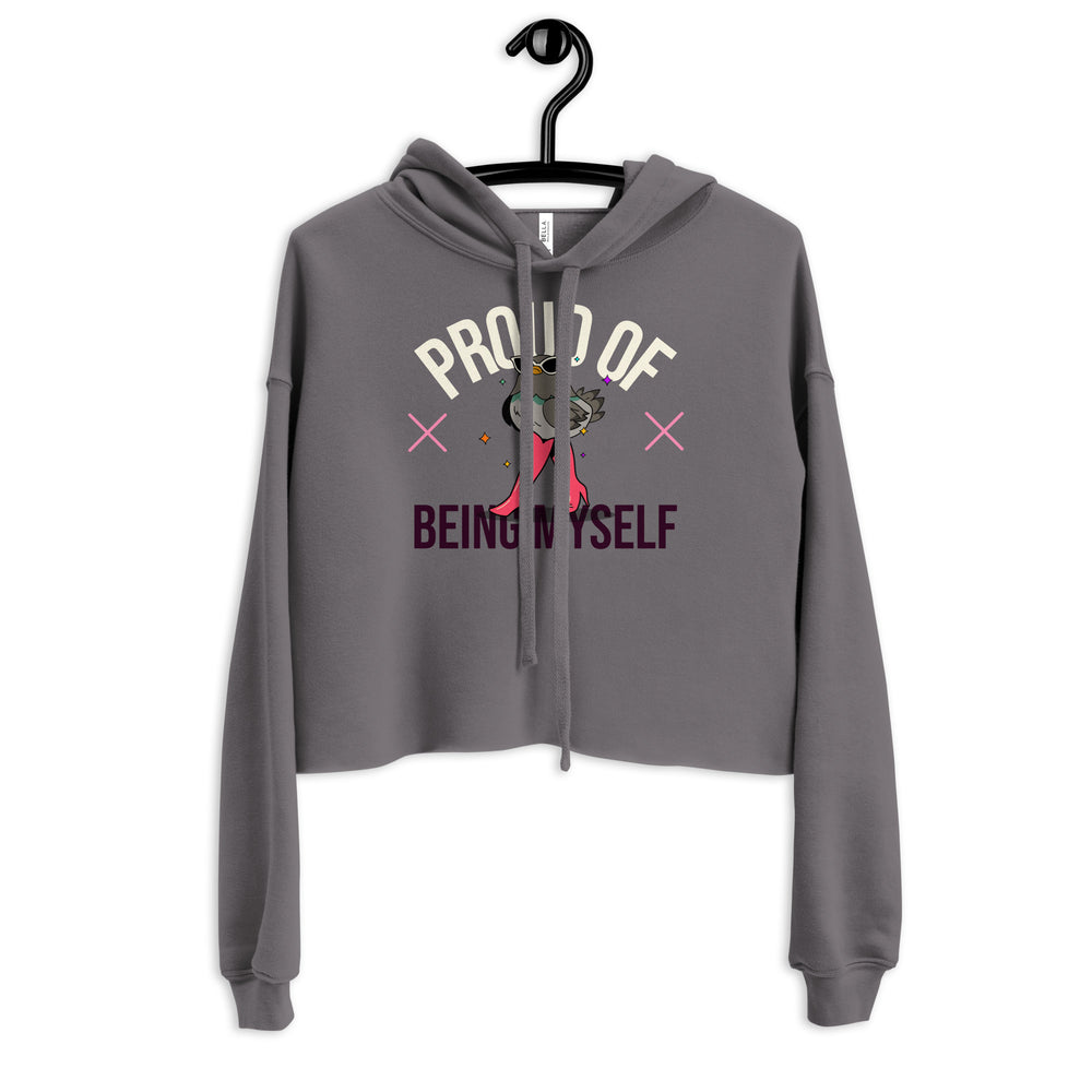 Gray crop hoodie with "PROUD OF" in bold beige, "BEING MYSELF" in dark purple, and a smiling cat with pink sparkles