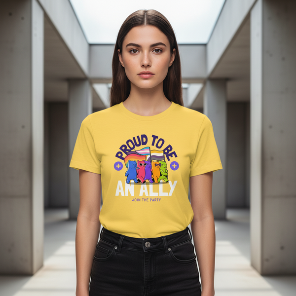 Proud To Be An Ally T-Shirt with bold cartoon animals and pride flags, modeled by a young woman in sunlight-filled corridor.