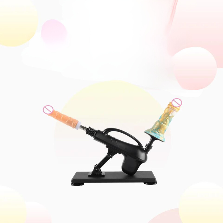 Black automatic sex machine with two angled flesh-toned attachments on a base