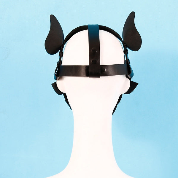 Front view of a black puppy-play hood with upright ears on a white mannequin head