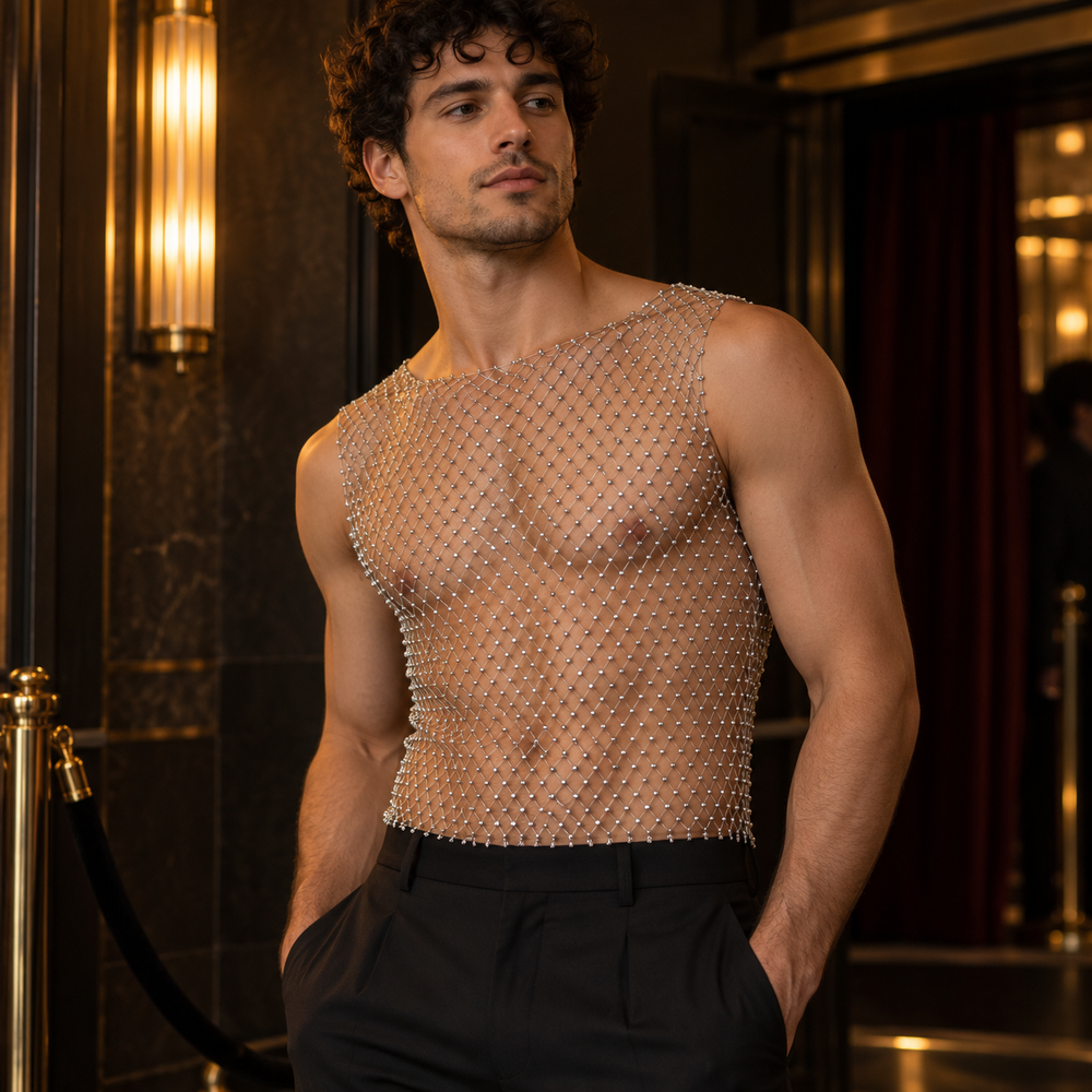 Adult model wearing Gleaming Mesh Tank Illusion in Silver, photographed in a styled fashion setting.