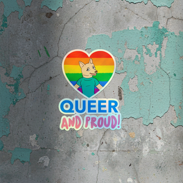 Holographic sticker shaped like a rainbow heart, with a cartoon dog in a blue shirt on a rainbow flag and “QUEER” in blue
