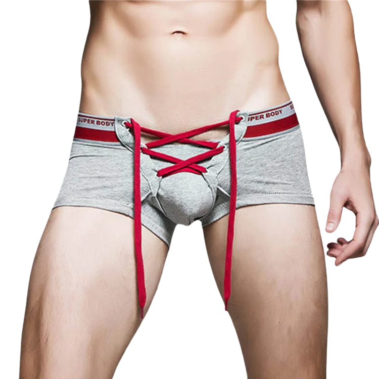 Front view of a model wearing gray boxer briefs with red crisscross lacing and long drawstrings