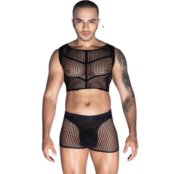 Front-facing model wearing a black fishnet crop top and boxer-style shorts