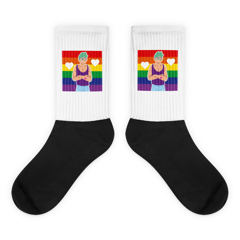 Pair of black-and-white crew socks with rainbow flags, hearts, and a teal-haired figure