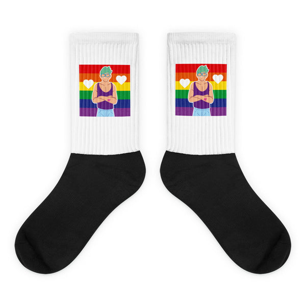 Pair of black-and-white crew socks with rainbow flags, hearts, and a teal-haired figure
