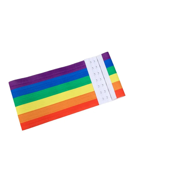 Flat-lay rainbow-striped chest binder with a white multi-row hook-and-eye closure
