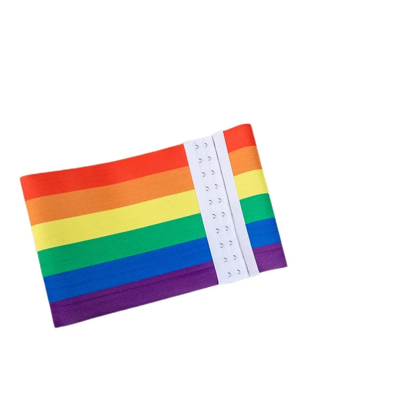 Flat-lay rainbow chest binder with a white multi-row hook-and-eye closure