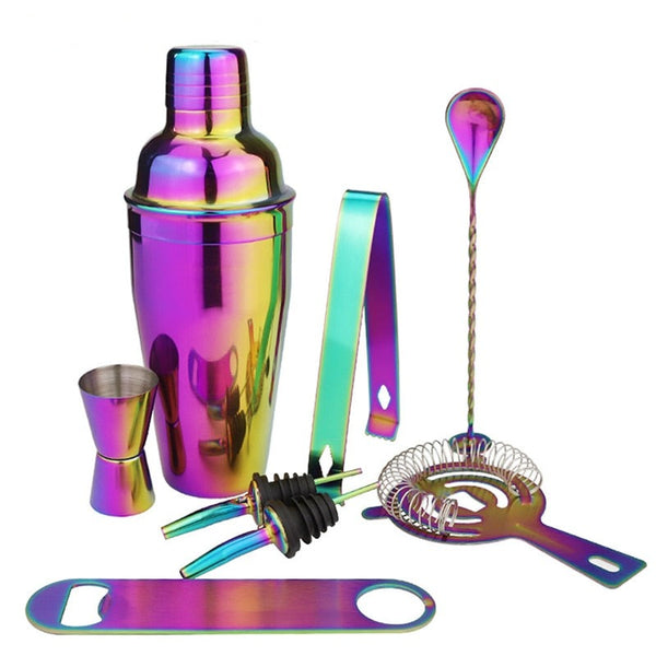Close-up of an iridescent rainbow cocktail shaker set with jigger, strainer, pourers, spoon and bottle opener