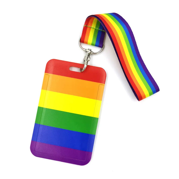 Rainbow-striped ID card holder with matching lanyard, shown at an angle on white