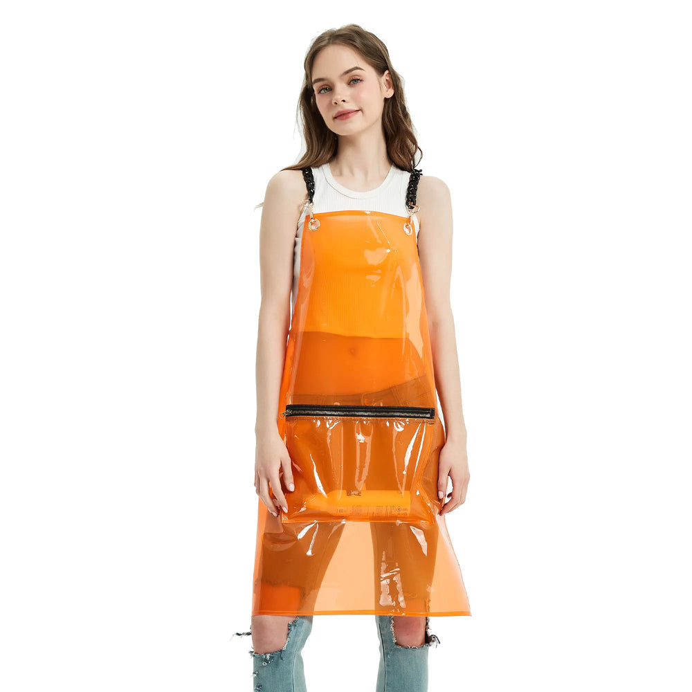 Front view of a model wearing a glossy transparent orange apron with a zippered pocket