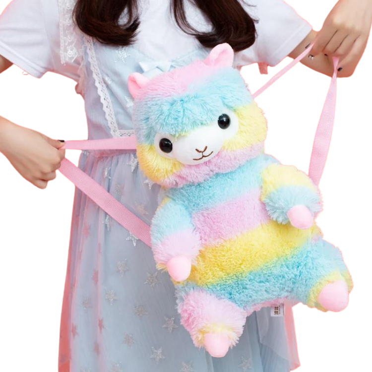 Model wearing a pastel rainbow alpaca backpack with pink shoulder straps