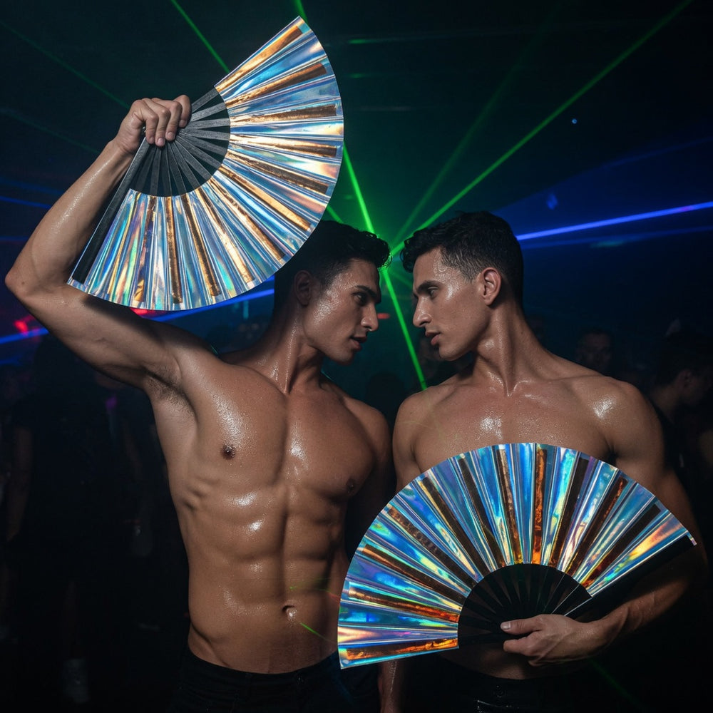Two shirtless people hold shimmering blue-and-gold folding fans at a laser-lit club