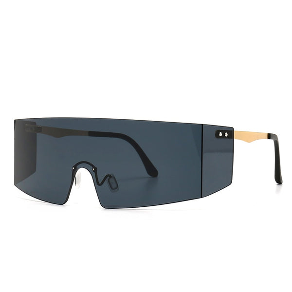 Front three-quarter view of oversized black shield sunglasses with a dark blue lens and gold temple