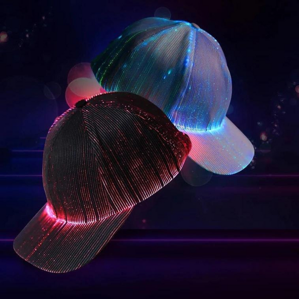 Two glowing LED fiber-optic baseball caps, one black and one translucent blue-white