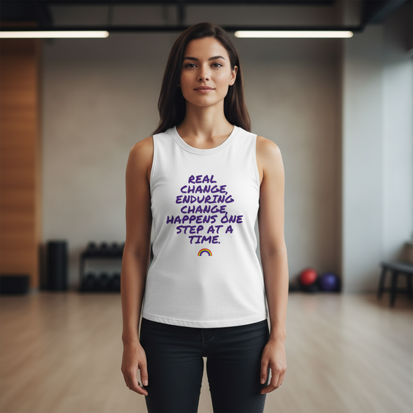 White muscle top with “Real change, enduring change, happens one step at a time” and purple arc