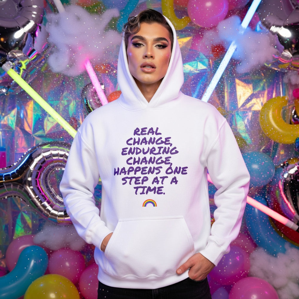 Unisex hoodie with "Real change, enduring change, happens one step at a time" and rainbow