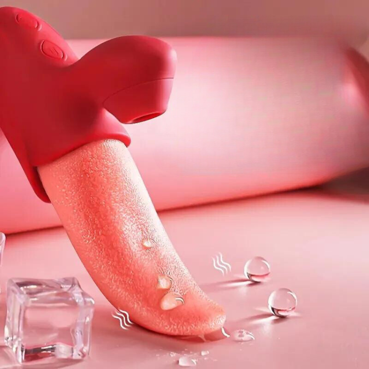Close-up of a pink realistic tongue-shaped pleasure toy beside an ice cube and water droplets
