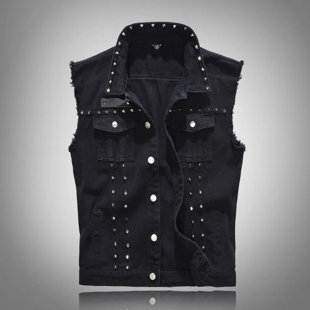 Front-facing black denim vest with frayed armholes, silver studs, pockets, and snap buttons